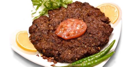  Chapli Kebab: ¡Un festín de carne picada y especias que te transportará a las calles bulliciosas de Peshawar!