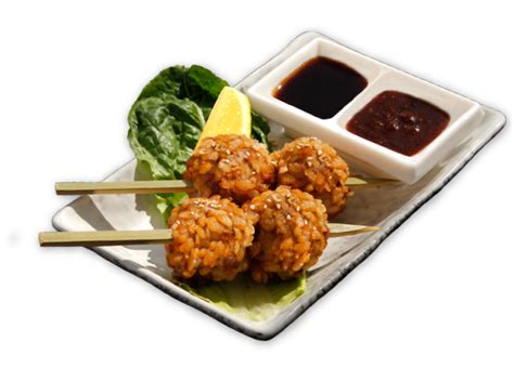  Tsukune: ¿Un manjar terrenal que combina la textura crujiente de las brochetas con el sabor umami de un caldo a base de miso?